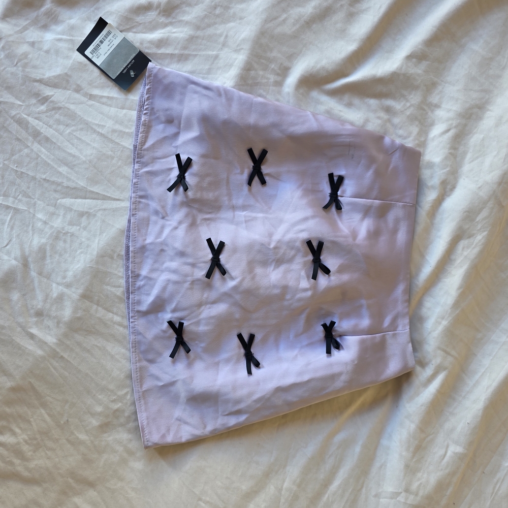 Lavender Skirt with Black Bow Accents From STORETS